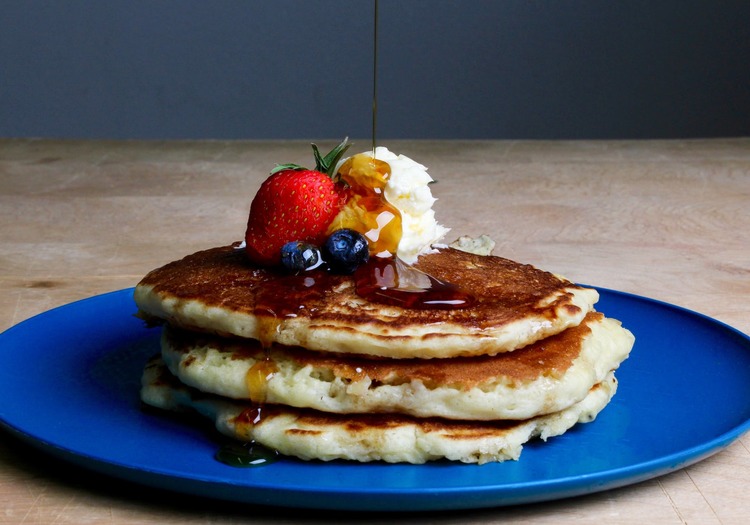 Pancakes With Strawberries, Blueberries, and Maple Syrup Recipe